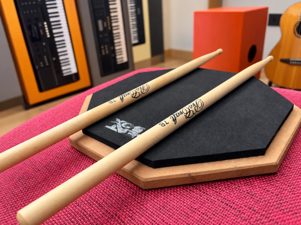 Drumsticks on a practice pad at Presto Forte in Thumpoly